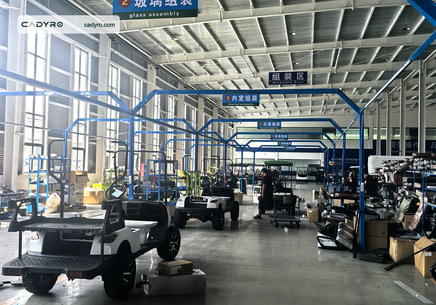 Cadyro Golf Cart assembly workshop with watermarked factory photo