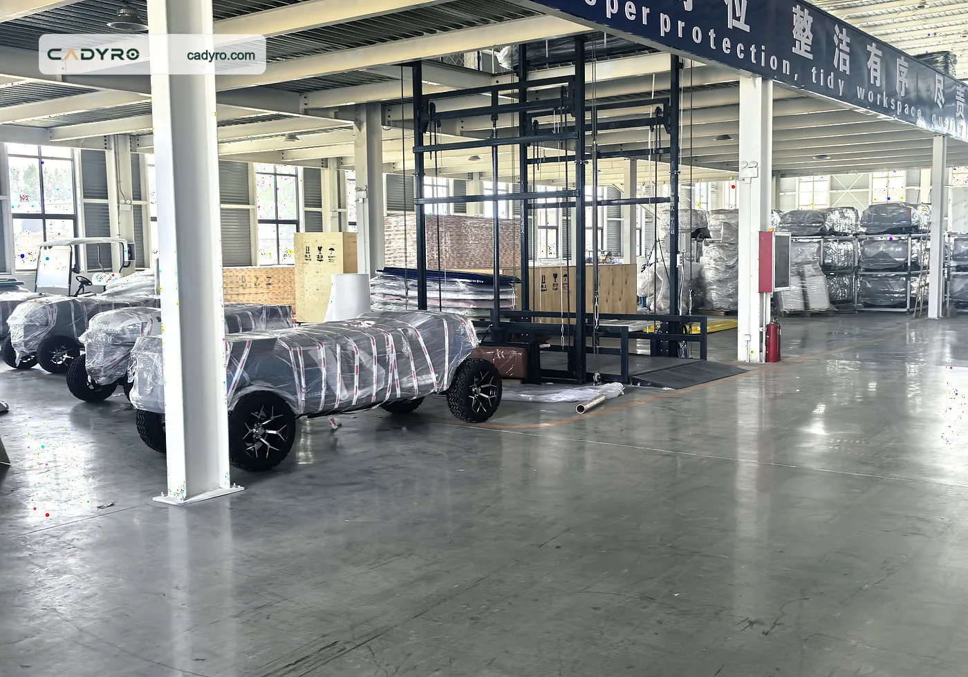 Electric golf carts prepared in the export packing area